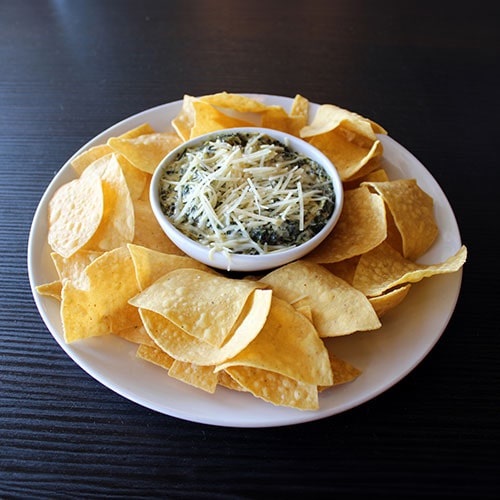 Our signature artichoke dip and chips